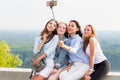 Selfie of four young girls students on nature Royalty Free Stock Photo