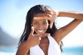 Selfie frame, hands and black woman at a beach for portrait photography, memory or gesture in nature. Finger, border and Royalty Free Stock Photo