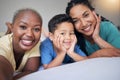 Selfie, gay family and happy on a bed in home bedroom for security, quality time and love. Adoption, lesbian or LGBTQ Royalty Free Stock Photo