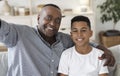Selfie With Grandfather. Happy black granddad and grandson taking photo together Royalty Free Stock Photo