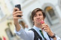 Selfie of handsome young man eating ice cream Royalty Free Stock Photo