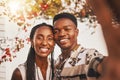 Selfie of happy black woman and man, couple in love on outdoor sunset date. Beautiful young girlfriend and boyfriend Royalty Free Stock Photo
