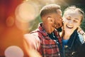 Selfie, kiss and interracial couple on a date in nature for support, love and bonding in Australia. Freedom, trust and Royalty Free Stock Photo