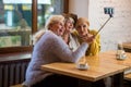 Selfie of ladies in cafe.