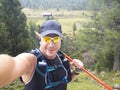 Selfie by a man who has been trailrunning in the carinthian mountains in august