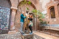 Selfie photo of couple man and woman hold statue of Juliet balcony in city Verona Italy. Travel concept Royalty Free Stock Photo