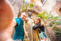 Selfie photo of couple man and woman hold statue of Juliet balcony in city Verona Italy. Travel concept Royalty Free Stock Photo