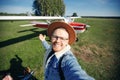 Selfie photo happy man pilot background white aircraft cockpit. Concept training private aviation Royalty Free Stock Photo