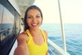 Selfie photo of young model woman on luxury travel cruise vacation in yellow dress enjoying the evening on Amalfi Coast