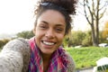 Selfie portrait of a smiling young woman