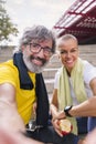 selfie of a senior man with his personal trainer Royalty Free Stock Photo