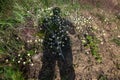 Selfie - shadow cast by the sun on a field of flowers