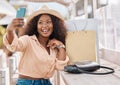 Selfie, shopping bags and woman with phone, happy in hat at city cafe. At the mall, girl with smile and smartphone on 5g Royalty Free Stock Photo