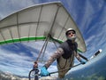 Selfie shot of hang glider pilot soaring the thermal updrafts