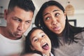 Selfie, silly and portrait of girl with her parents bonding in the living room of their home. Goofy, happy and child Royalty Free Stock Photo