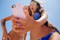 Selfie smartphone girls beach Royalty Free Stock Photo