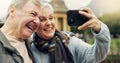 Selfie, smile and senior couple in a park, happy and laugh, relax and bond in nature on the weekend. Love, fun and Royalty Free Stock Photo