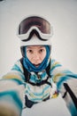 Portrait of woman on a snow-covered ski slope Royalty Free Stock Photo