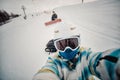 Portrait of woman on a snow-covered ski slope Royalty Free Stock Photo