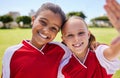 Selfie, soccer and sport with a girl team taking a photograph on a football field before a game with a smile. Children