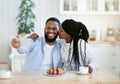 Selfie Time. Cheerful Black Guy Taking Photo With His Girlfriend In Kitchen Royalty Free Stock Photo