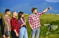 Selfie time concept. People in nature taking happy selfie landscape background. Capturing memories. Men and women posing