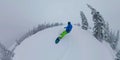 SELFIE: Tourist enjoys a scenic snowboard session in untouched backcountry. Royalty Free Stock Photo