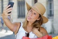 Selfie tourist woman making silly faces