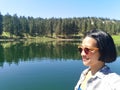 Selfie of young woman at Martin lake near Princeton, British Columbia, Canada Royalty Free Stock Photo