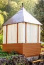 Selfmade backyard shed in the garden for garden tools and storage space Royalty Free Stock Photo