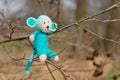 Selfmade stuffed monkey in tree