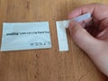 Selftesting rapid test for SARS CoV coronavirus deases, man hand in process Royalty Free Stock Photo