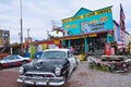 Chrysler Police Car in front of Historic Seligman Sundries Cafe.