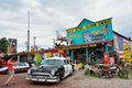 Chrysler Police Car in front of Historic Seligman Sundries Cafe.