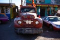 Seligman, AZ, USA, November 1st, 2019: Old rusty cars parket by the side of the road Royalty Free Stock Photo