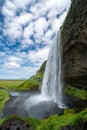 Seljalandsfoss waterfall in Iceland, approaching the back side of the falls