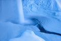 Seljalandsfoss waterfall, Iceland. Icelandic winter landscape.  High waterfall and rocks. Snow and ice. Powerful stream of water f Royalty Free Stock Photo