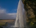 Seljalandsfoss waterfall in Iceland from the side Royalty Free Stock Photo