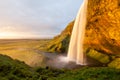 Seljalandsfoss waterfall at sunset, South-West Iceland Royalty Free Stock Photo