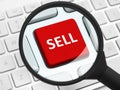 Sell button under the magnifying glass Royalty Free Stock Photo