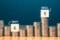 Sell High Buy Low on Heap Coins Royalty Free Stock Photo