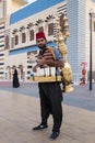 Seller drinks in the national Turkish clothes