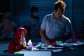 The seller of es campur (mixed ice with some fruits). Es campur is one indonesian street food Royalty Free Stock Photo