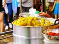 The seller food steaming dim sum in stainless steamer pot for selling at Chatuchak market, Bangkok, Thailand.