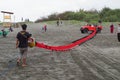 The seller of kites on parang tritis beach, Yogyakarta, Indonesia