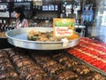 Seller near trays with local sweets in Pyatigorsk