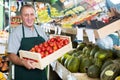 Seller is offering red tomatos