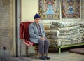 Seller of Persian carpets on the market of Shiraz