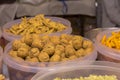 A seller selling delicious Gujarati salty snacks items at Industrial trade fair in Kolkata, West Bengal, India