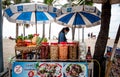 A seller is selling papaya salad in a seaside shop, Bang Saen, Chonburi, Thailand